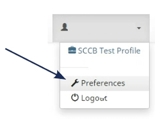 Screenshot of a user profile dropdown menu in a banking application with the 'Preferences' option highlighted by an arrow.